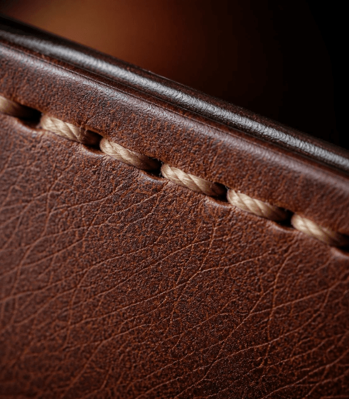 perfect saddle stitch on premium vegetable-tanned brown leather
